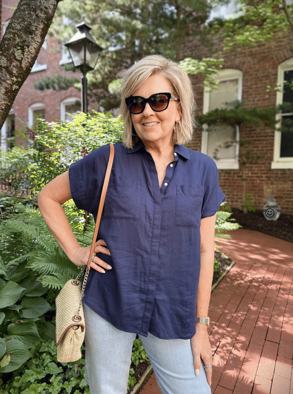 woman wearing navy short sleeve top from Nordstrom Rack for summer